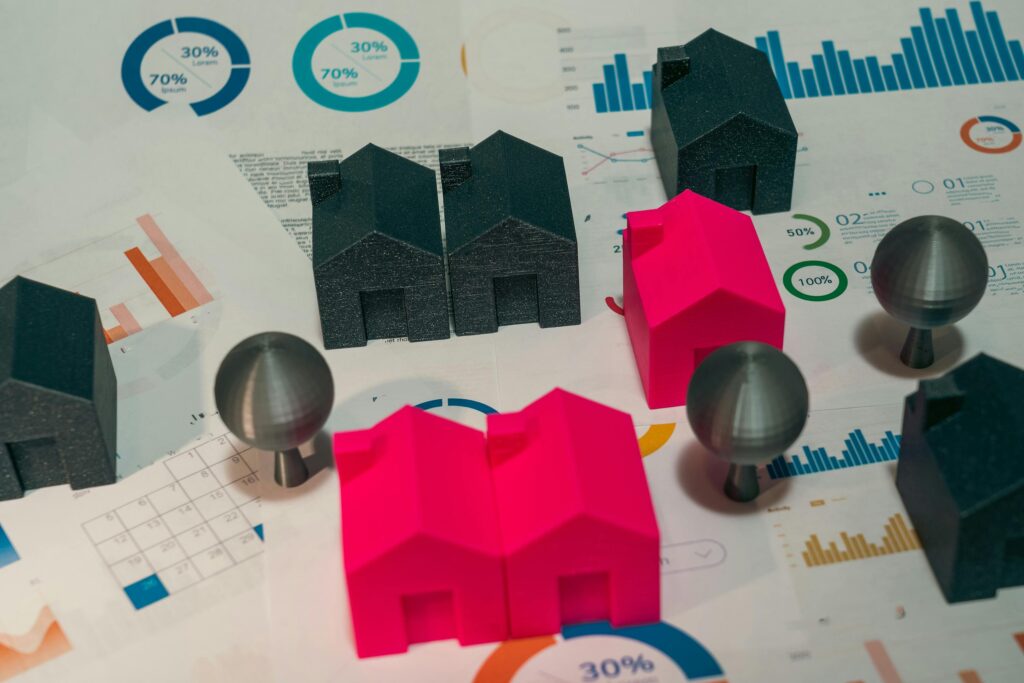 Abstract representation of real estate market comp model houses and charts.